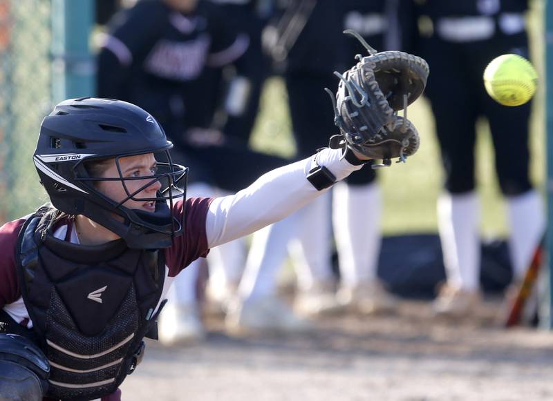 Marengo's Kylee Jensen catches a pitch during a nonconference softball game against Antioch on Monday, March 31, 2025, at Marengo High School.