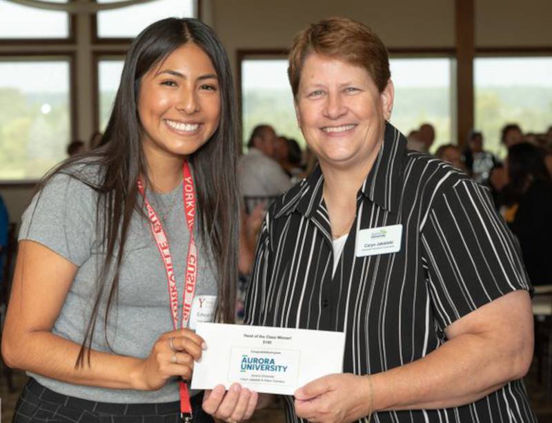 Ezbeydy Rivera, YCUSD 115 Dual Language teacher, left, with Aurora University Graduate Admission Counselor Caryn Jakielski at the Yorkville Area Chamber of Commerce's annual New Teacher Welcome Breakfast.