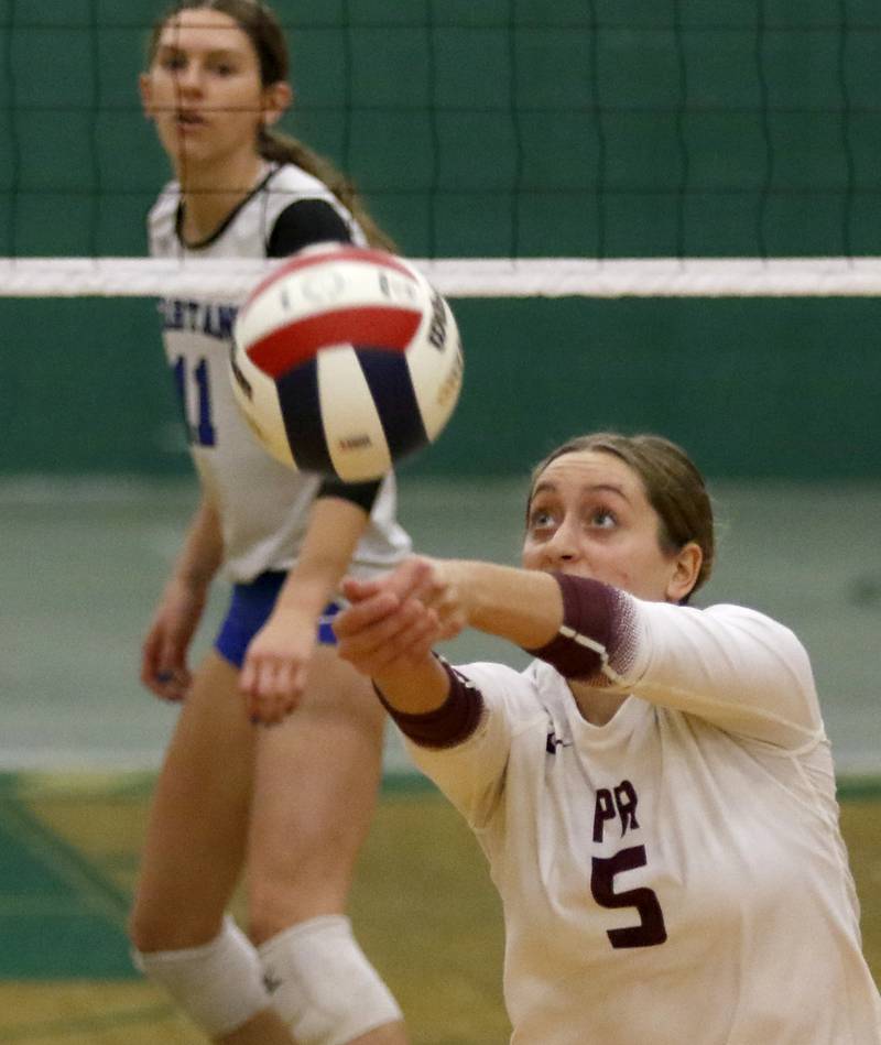 Prairie Ridge's Grace Jansen bumps the ball during the IHSA Class 3A Grayslake Central Supersectional volleyball match against St. Francis on Monday, Nov. 11, 2024, at Grayslake Central High School.