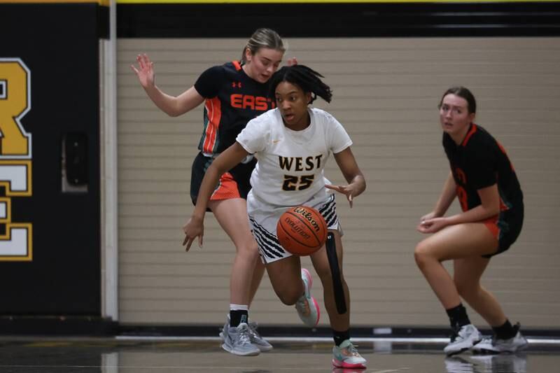 Joliet West’s Maziah Shelton takes the rebound upcourt against Plainfield East on Thursday, February 2nd.