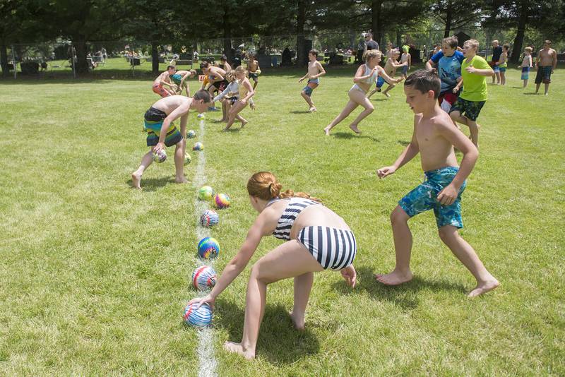 A game of dodgeball gets going after lunch Wednesday, June 15, 2022. Campers were also treated to a cool treat from Kona Ice.