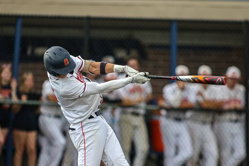 Oswego's Tyler Stack (25) hits a pitch over the head of the center fielder during Class 4A Romeoville Sectional semifinal game between Plainfield North at Oswego.  June 1, 2023.