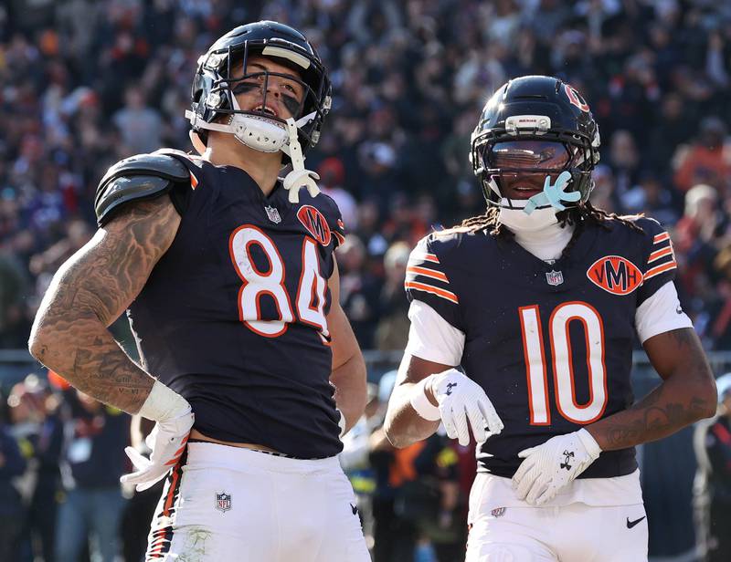 Chicago Bears tight end Colston Loveland (left) celebrates after catching a touchdown pass during their game Sunday, Nov. 23, 2025, against the Pittsburgh Steelers at Soldier Field in Chicago.