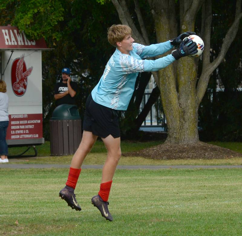 Oregon goalkeeper Deryk Withers catches a shot on goal by Pecatonica during a Tuesday, Sept. 23, 2025 game at Oregon Park West.