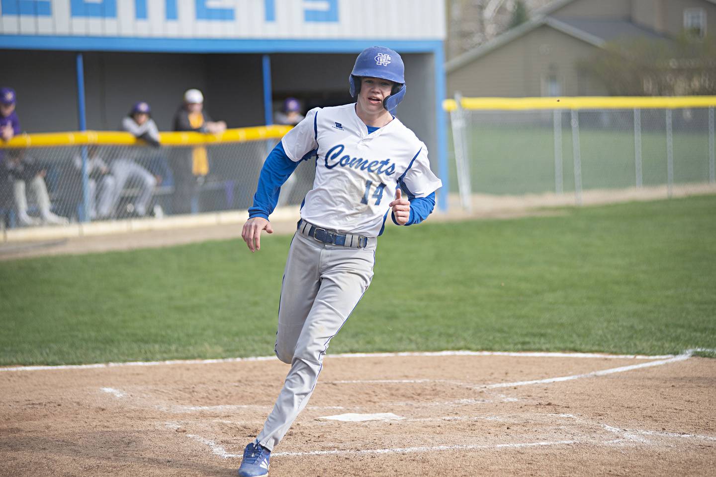 Newman’s Kory Mullen comes in to score on a wild pitch against Mendota Thursday, April 28, 2022