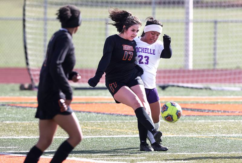 DeKalb's Natalie Delgado and Rochelle's Lucy Monroy collide at the ball during their game Thursday, April 14, 2022, at DeKalb High School.