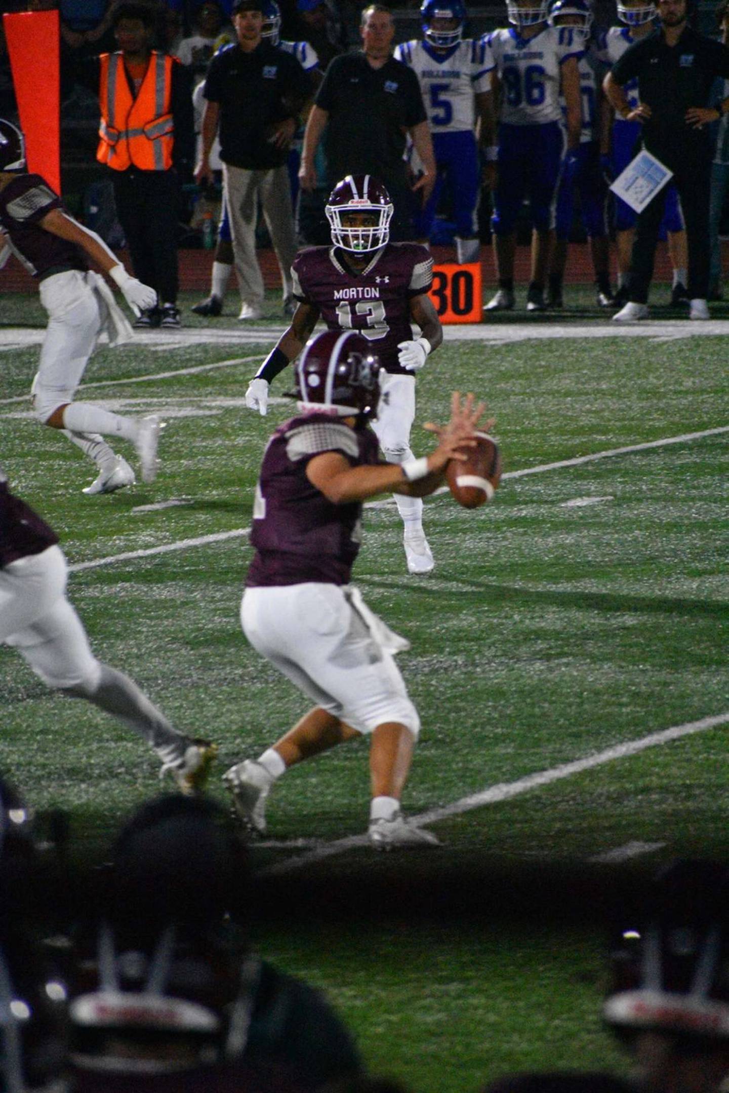 Morton senior David Hernandez (throwing), who opened his career on the Freshman "B" team," has worked his way up to become the Mustangs' starting quarterback this season.