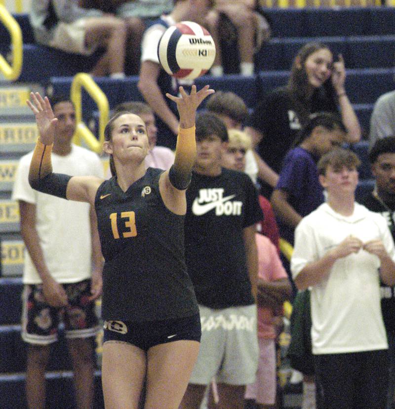 Sterling's Marley Sechrest begins her serve. The action took place at the Sterling vs. Geneseo Volleyball match at Homer Musgrove fieldhouse, on Thursday, Sept. 5, 2024 .