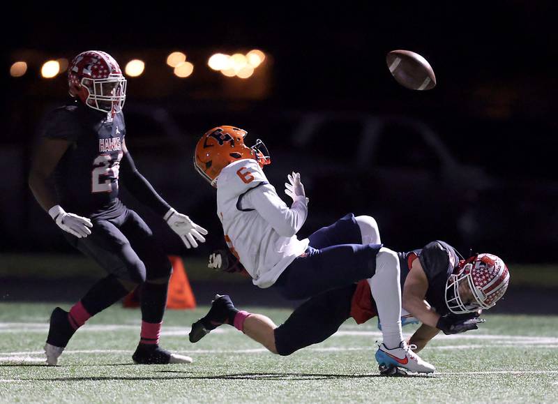 Maine South's Thomas Naughton (3) collides with Evanston's Andrew Barker (6) Friday October 20, 2023 in Park Ridge.