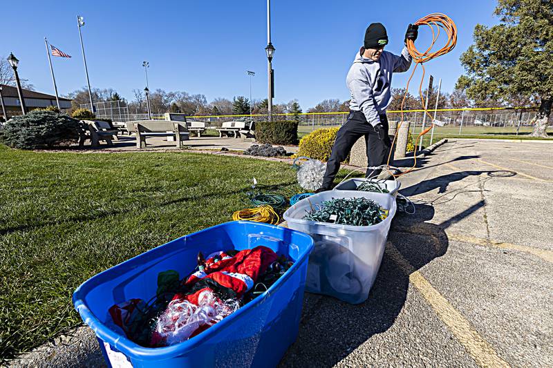 7:24 Fitness on the Rock’s Nick Pepper prepares his lighted display Saturday, Nov. 18, 2023 at Centennial Park in Rock Falls.