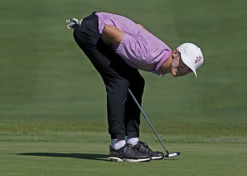 Hampshire’s Nolan Adamczyk reacts to missing a birdie putt on the 11th green during the Fox Valley Conference Boys Golf Tournament Wednesday, Sept. 25, 2024, at RedTail Golf Club in Lakewood.