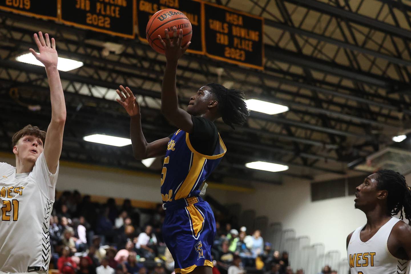 Joliet Central’s Deven Triplett lays in a shot against Joliet West on Tuesday, Nov. 28, 2023 in Joliet.