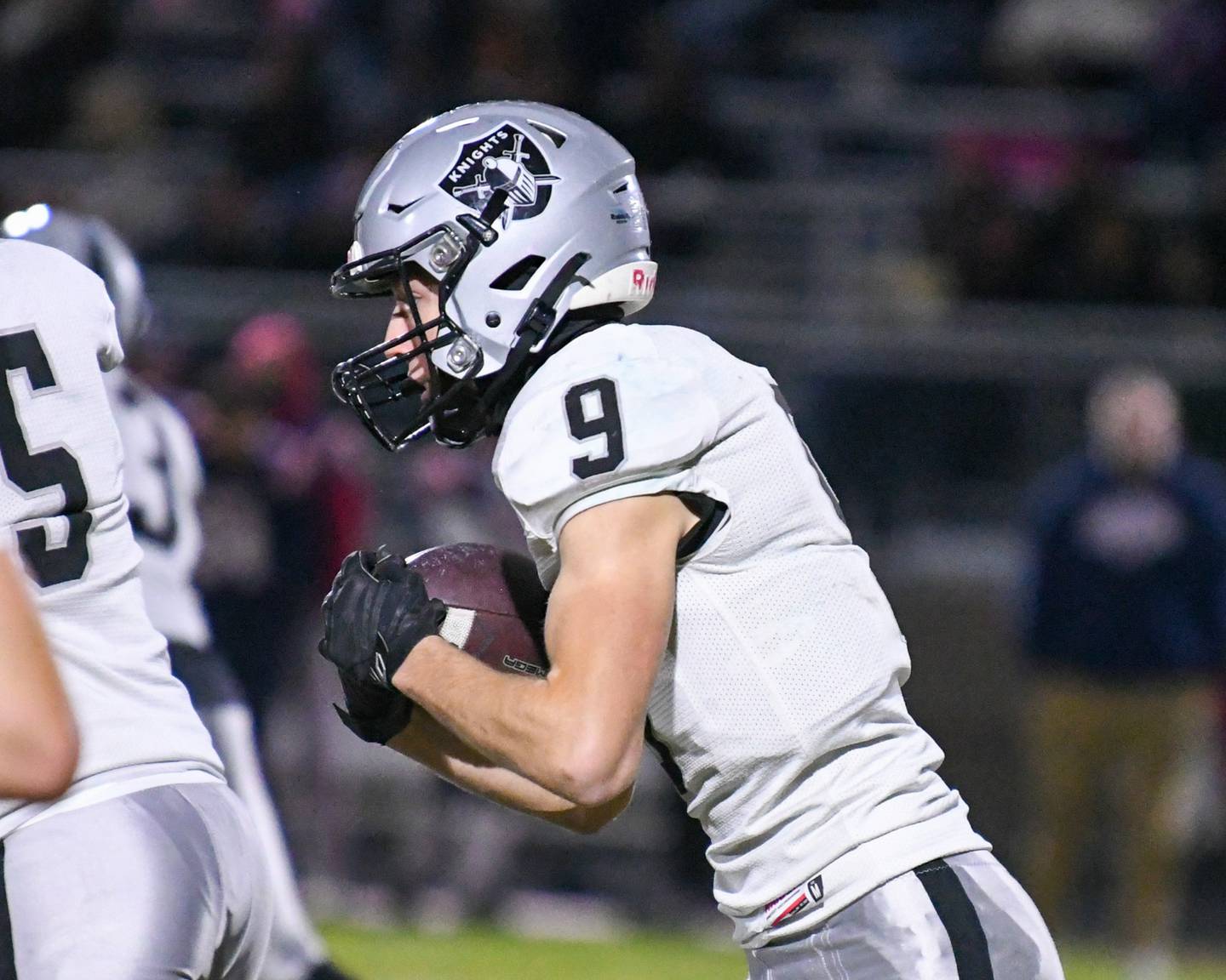 Kaneland's Carter Grabowski (9) runs the ball while traveling to take on Belvidere North High School on Friday Nov. 1, 2024, during the first week of playoffs.