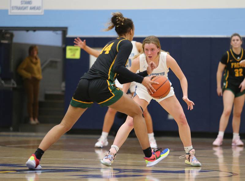 Nazareth's Amalia Dray (25) plays defense during the girls varsity basketball game between Fremd and Nazareth on Monday, Jan. 9, 2023 in La Grange Park, IL.