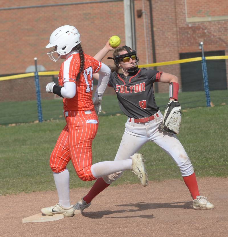 Fulton's Kira Wilson steps on second base and throws to first for the double play against Milledgeville at the Pearl City Tournament on Saturday, April 12, 2025. Fulton finished fourth.