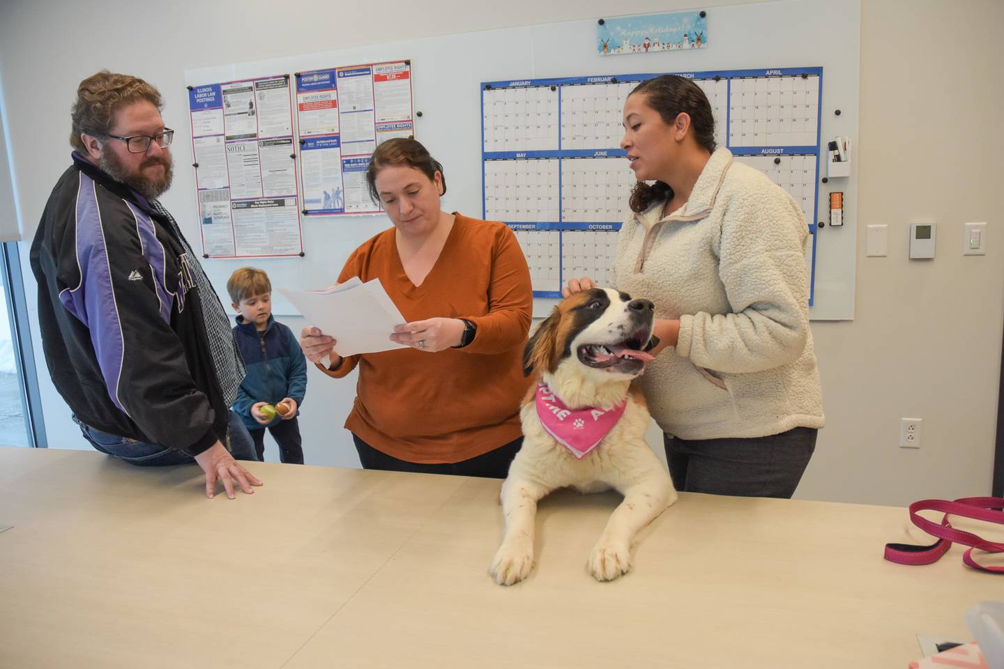 Lucy, an energetic St. Bernard puppy, meets her new family after being the first adopted animal from Will County Animal Protection Services. Lucy was adopted by Will County Assistant State’s Attorney Toni Renken, who supported the department during ordinance updates.