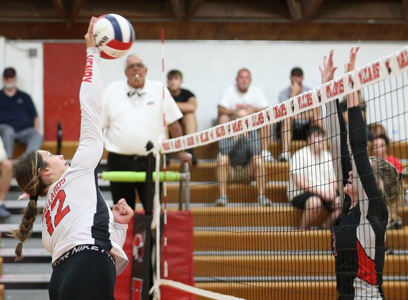 Henry-Senachwine's Kaitlyn Anderson blasts a kill past Woodland on Thursday, Oct. 3, 2024 at Henry-Senachwine High School.
