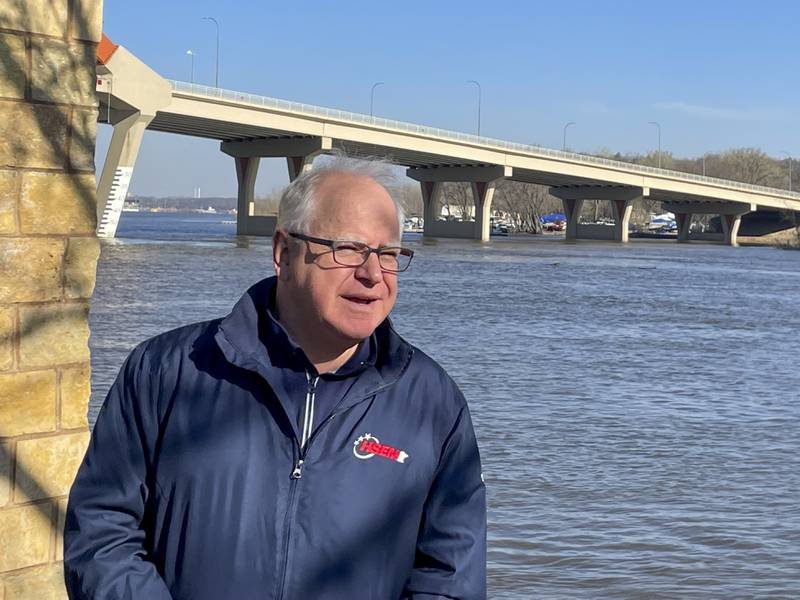 Minnesota Gov. Tim Walz checks on flood preparations along the Mississippi River in Hastings, Minn., Friday, April 14, 2023 in Minnesota.  On Thursday, the National Weather Service issued a flood warning for Fulton, Illinois, based on the pace of snowmelt and the rapid rise of the Mississippi River south of Dubuque.