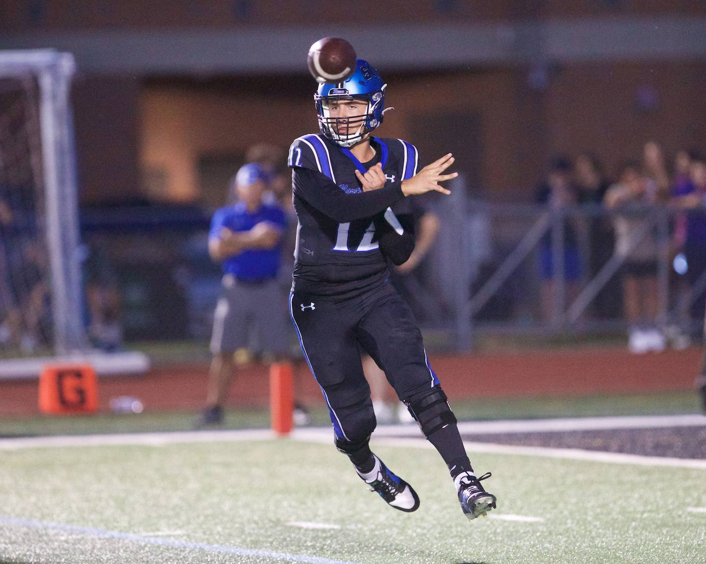 St. Charles North's J.T. Padron makes a throw against Geneva on Sept. 12, 2025 in St. Charles.