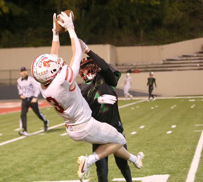 Ottawa's Hayden Swett makes a catch over L-P's Noah Zebron on Friday, Oct. 6, 2023 at Howard Fellows Stadium.