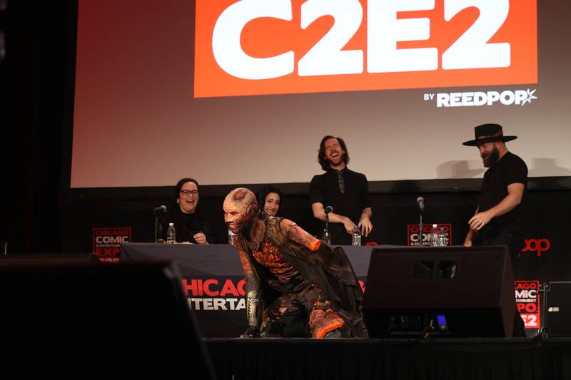 Judges break out laughing as a cosplayer dressed as Crispy Anakin, from the movie Star Wars, takes the stage for the Cosplay Central Showcase at C2E2 Chicago Comic & Entertainment Expo on Sunday, April 2, 2023 at McCormick Place in Chicago.