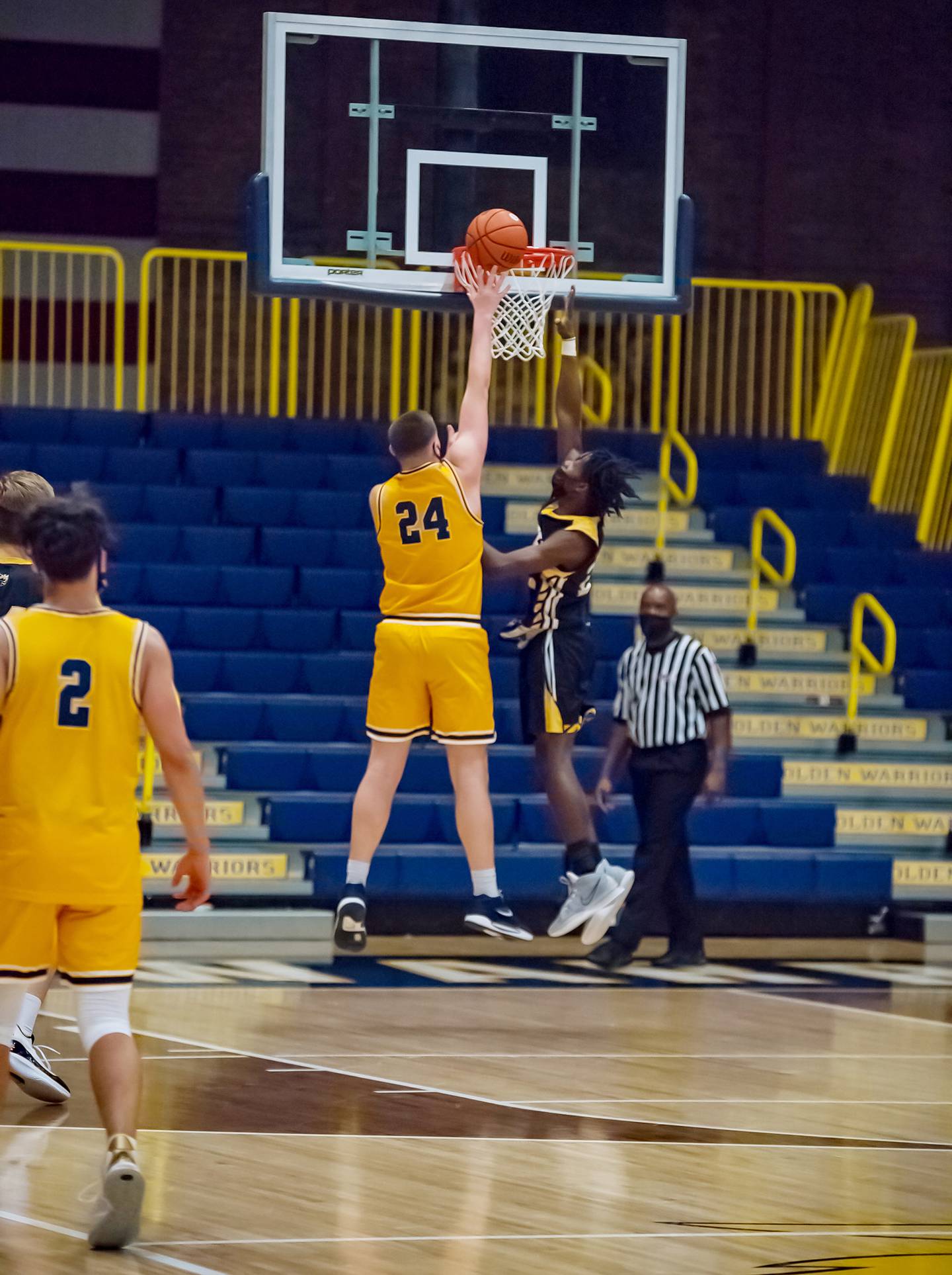 Sterling's Lucas Austin (24) shoots against Hinsdale South's Cassidy Whitaker during their Sterling MLK tournament game Saturday evening at Musgrove Fieldhouse.