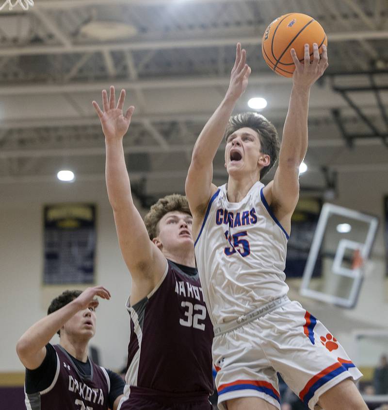 Eastland’s Parker Krogman puts up a shot against Dakota’s Braxton Niedermeier Wednesday, March 5, 2025, during the Class 1A boys basketball Sectional semifinal at Pecatonica High School.