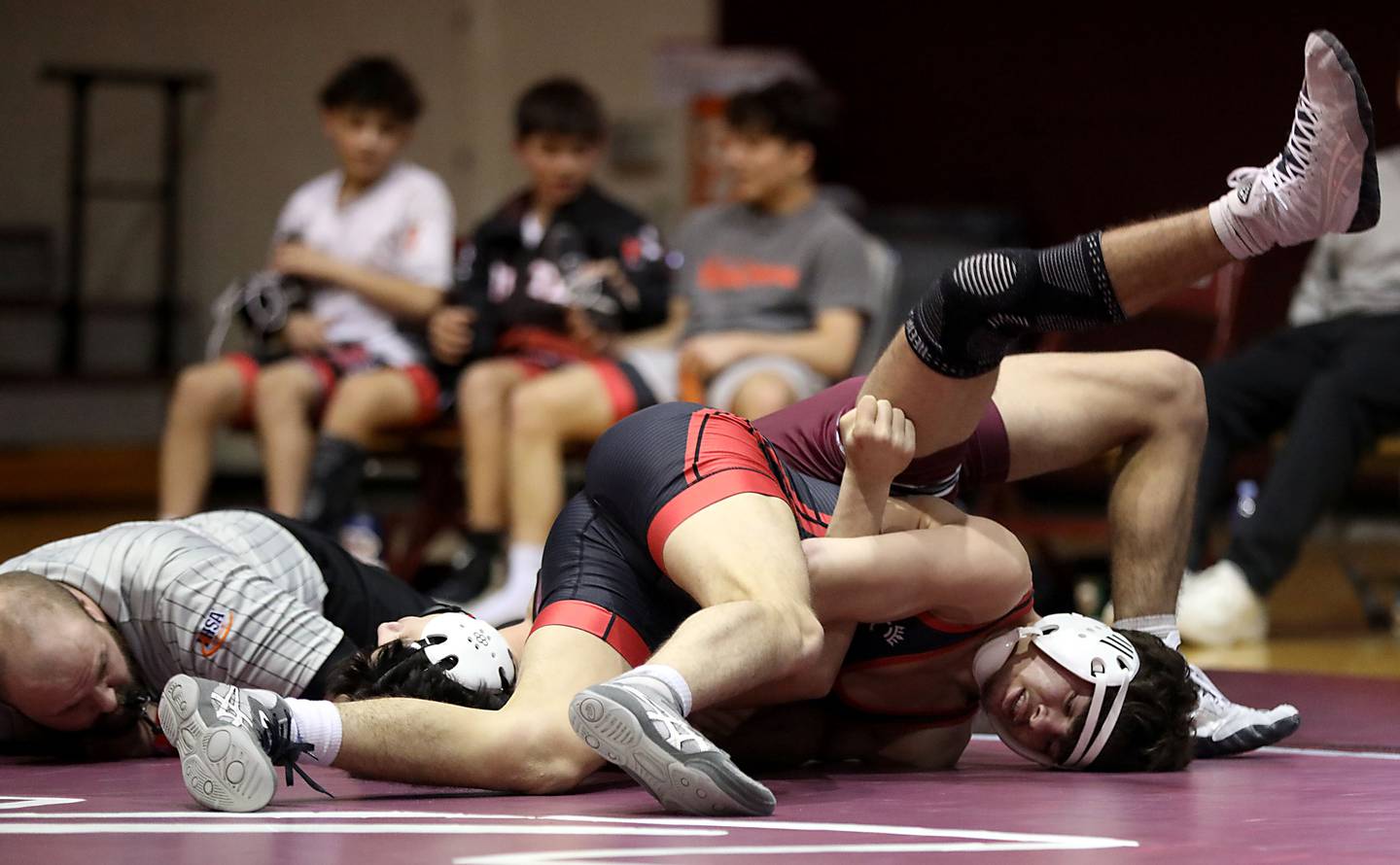 Huntley’s Gavin Nischke pins Prairie Ridge’s Eli Ruiz during the 144-pound match of a Fox Valley Conference boys wrestling meet on Thursday, Jan. 22, 2026, at Prairie Ridge High School Crystal Lake.