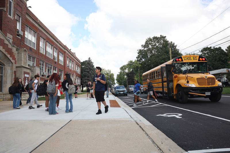 Students arrive at Lockport Township High School Central Campus for the first day of the new school year on Monday, August 19, 2024.