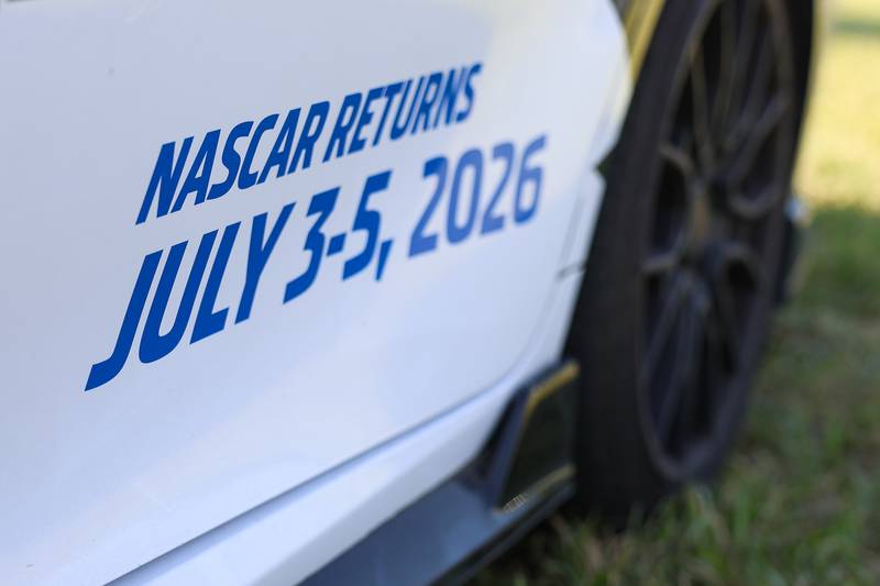 A NASCAR Toyota Next Gen car promotes the return of NASCAR to Joliet at the unveiling of the new Route 66 sculpture along South Chicago Street at the Route 66 Raceway on Tuesday, May 12, 2026 in Joliet.