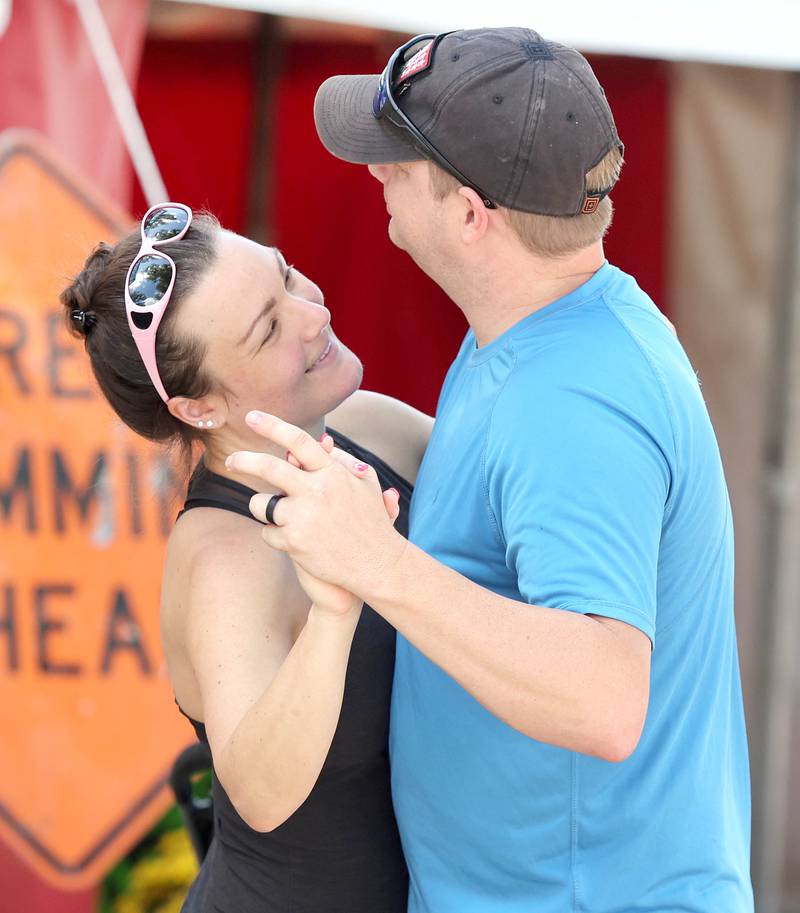 Jim and Heather Sutton dance to the music of some of the traveling musicians at the fairgrounds Wednesday, Sept. 7, 2022, on opening day of the Sandwich Fair. The fair continues this week through Sunday.