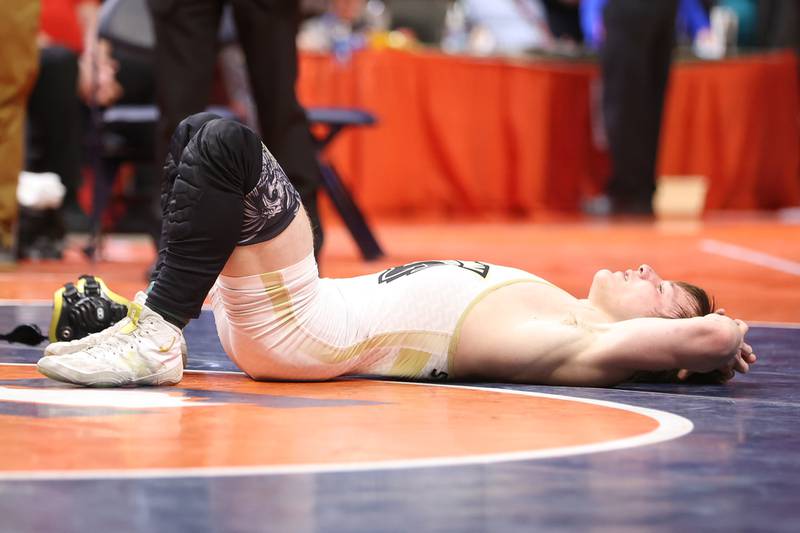 Sycamore’s Brayden Peet takes a moment after his loss against Aura Christian’s Braden Stauffenberg in the Class 2A 152lb. championship match at State Farm Center in Champaign. Saturday, Feb. 19, 2022, in Champaign.