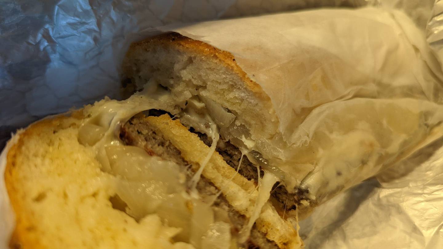 The poor boy from Mark's on 59 in Shorewood came with grilled onions and was served on garlic bread.