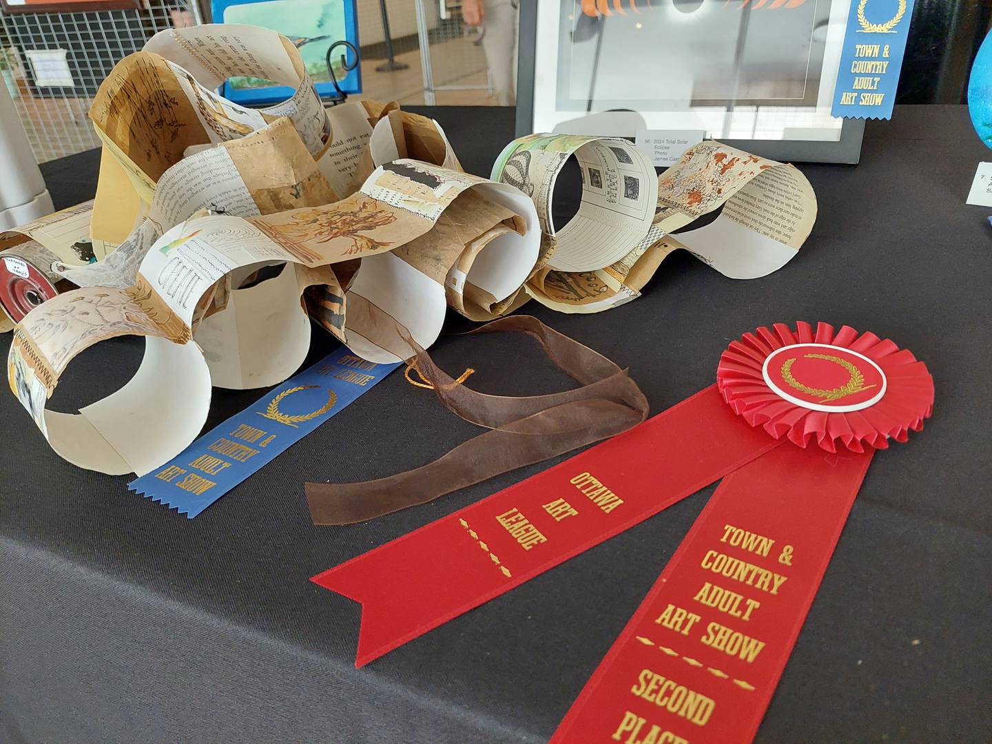 “Spool of Thoughts,” a mixed media piece by Reanna Pelszynski, was awarded second place in the 66th annual Town and Country Amateur Art Show at Jeremiah Joe Coffee in Ottawa.