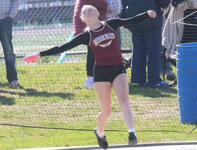 Morris's Aniston Caputo throws discus during the Class 2A Sectional track meet on Wednesday, May 13, 2026 in the Jeff Prusator Athletic Complex at Mendota High School.