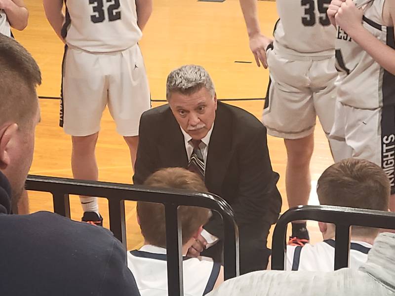 Fieldcrest coach Matt Winkler talks to his club during a timeout in Friday night's Heart of Illinois Conference game in Minonk against Heyworth.
The Knights dropped a 64-61 decision to the Hornets in Winkler's final home game as head coach.