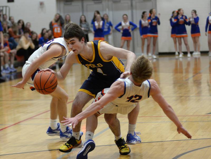 Polo's Brock Soltow drives to the basket as Eastland's Adam Awender (12) falls to the ground on Friday, Feb. 23, 2024 at the 1A Forreston Regional championship game at Forreston High School.