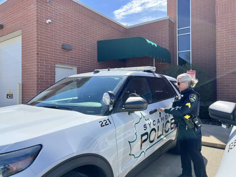 Sycamore Police Sgt. Sharon Anderson, who has been on the force for more three decades, gets ready to go on patrol in her squad car on April 19, 2024.