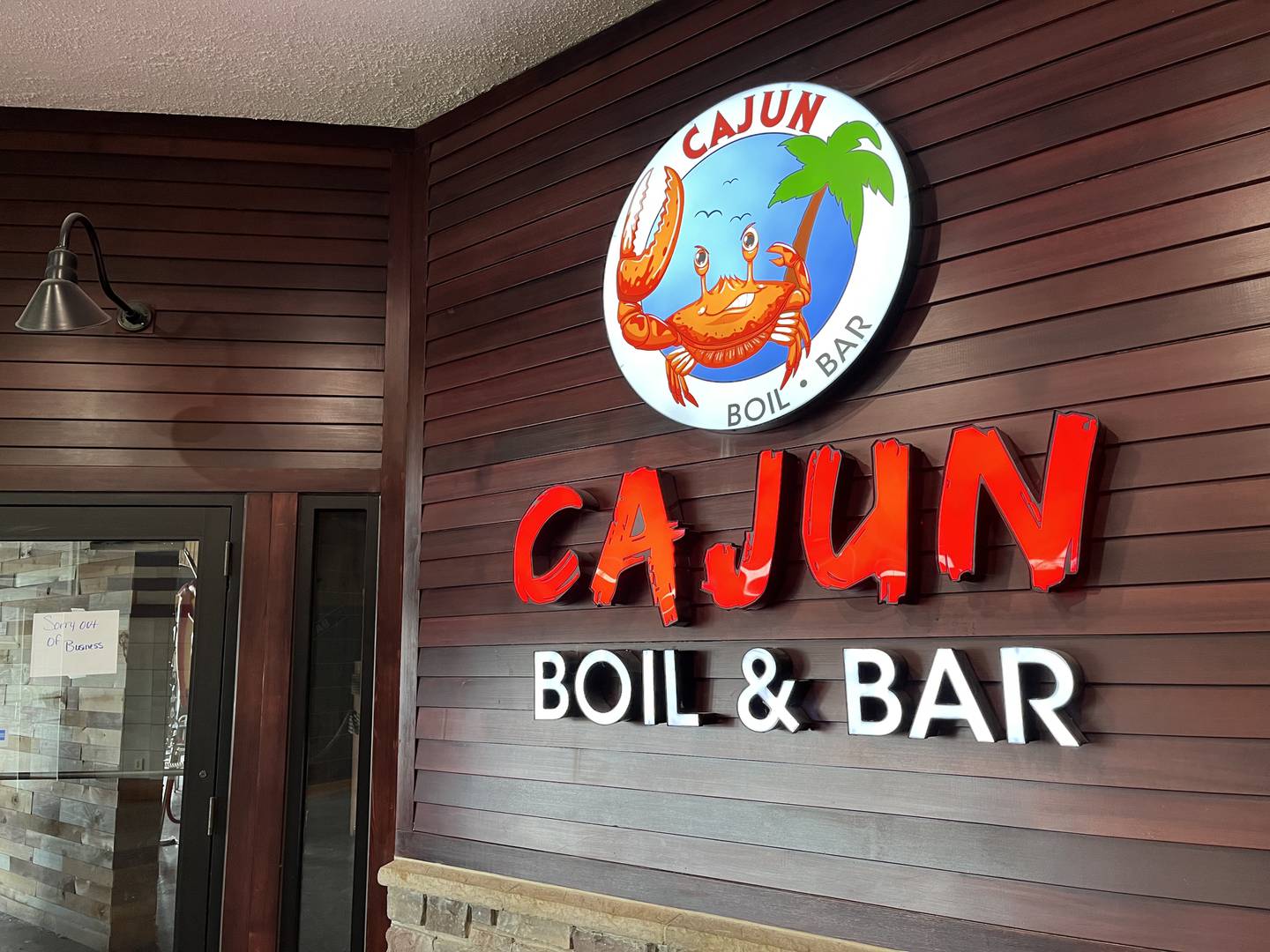 Indoor sign for Cajun Boil & Bar, 3340 Mall Loop Drive, Joliet, seen on Wednesday, Feb. 8, 2023.