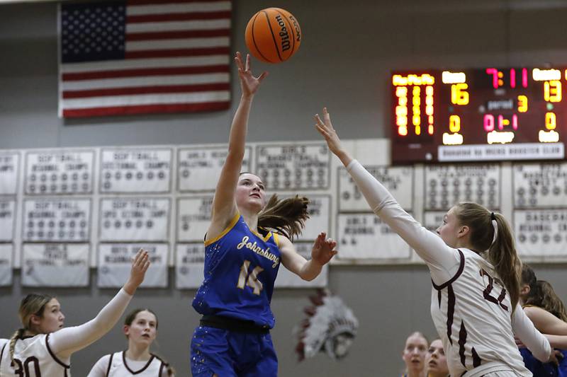 Johnsburg's Summer Toussaint drives to the basket against Marengo's Dayna Carr during a Kishwaukee River Conference basketball game on Saturday, Feb. 1, 2025, at Marengo High School.