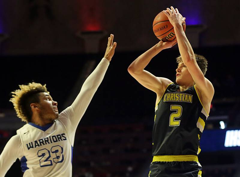 Yorkville Christian's Jaden Schutt (2) sinks a three-point basket over Steeleville's Carter Wasson (23) in the Class 1A State semifinal game on Thursday, March 10, 2022 at the State Farm Center in Champaign.