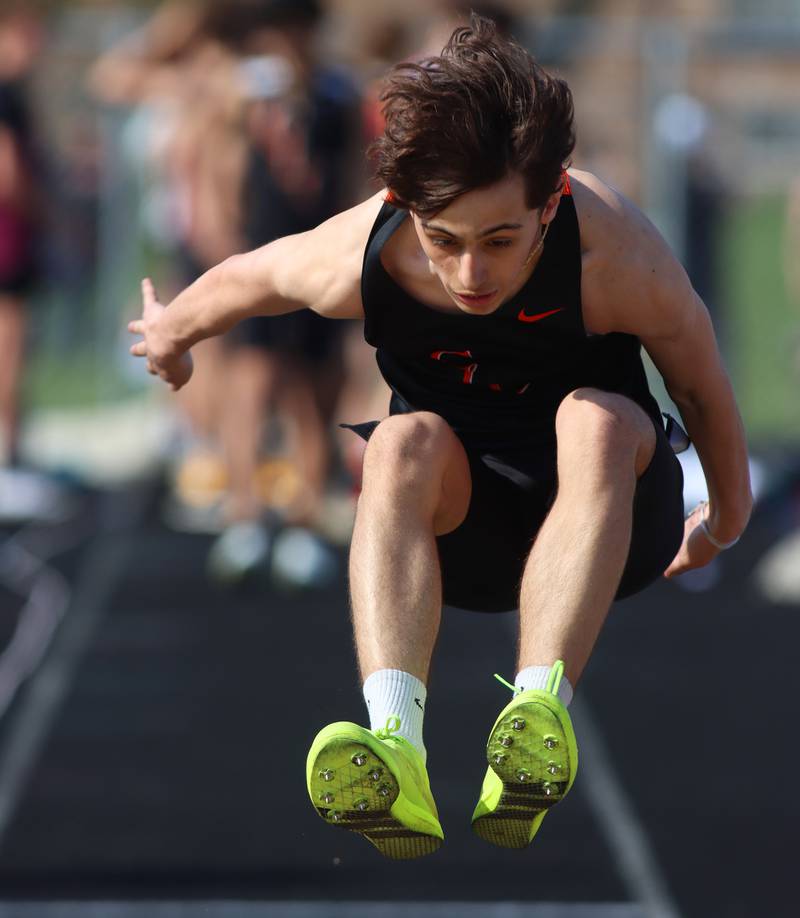 Crystal Lake Central’s  Jayden Vargas competes in the triple jump during the McHenry County Track and Field Meet at McCracken Field on Thursday, April 24, 2025, in McHenry