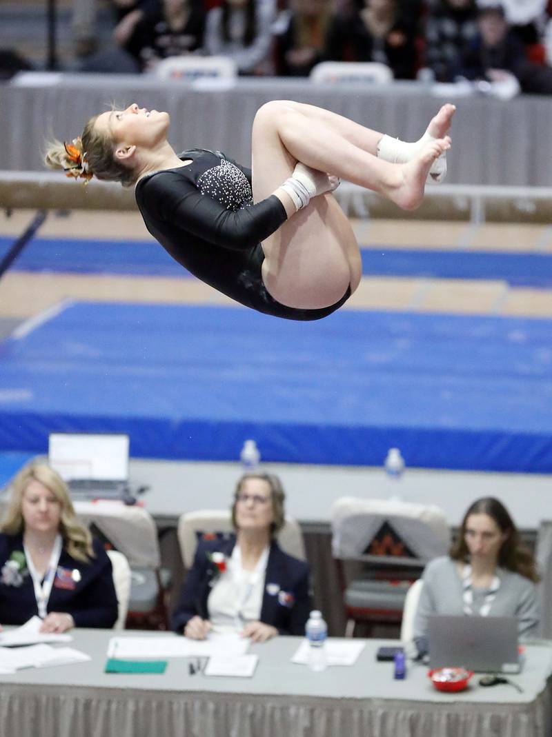 Eden Russell of DeKalb competes on the uneven parallel bars during the IHSA Girls Gymnastics state finals Saturday February 18, 2023 in Palatine.