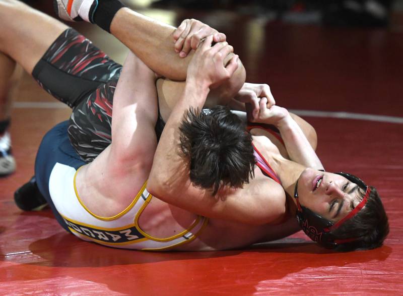 Fulton's Brayden Powell puts a hold on Polo's Kaenyn McCarren in their 157 match at Oregon High School on Thursday, Dec. 4, 2025.