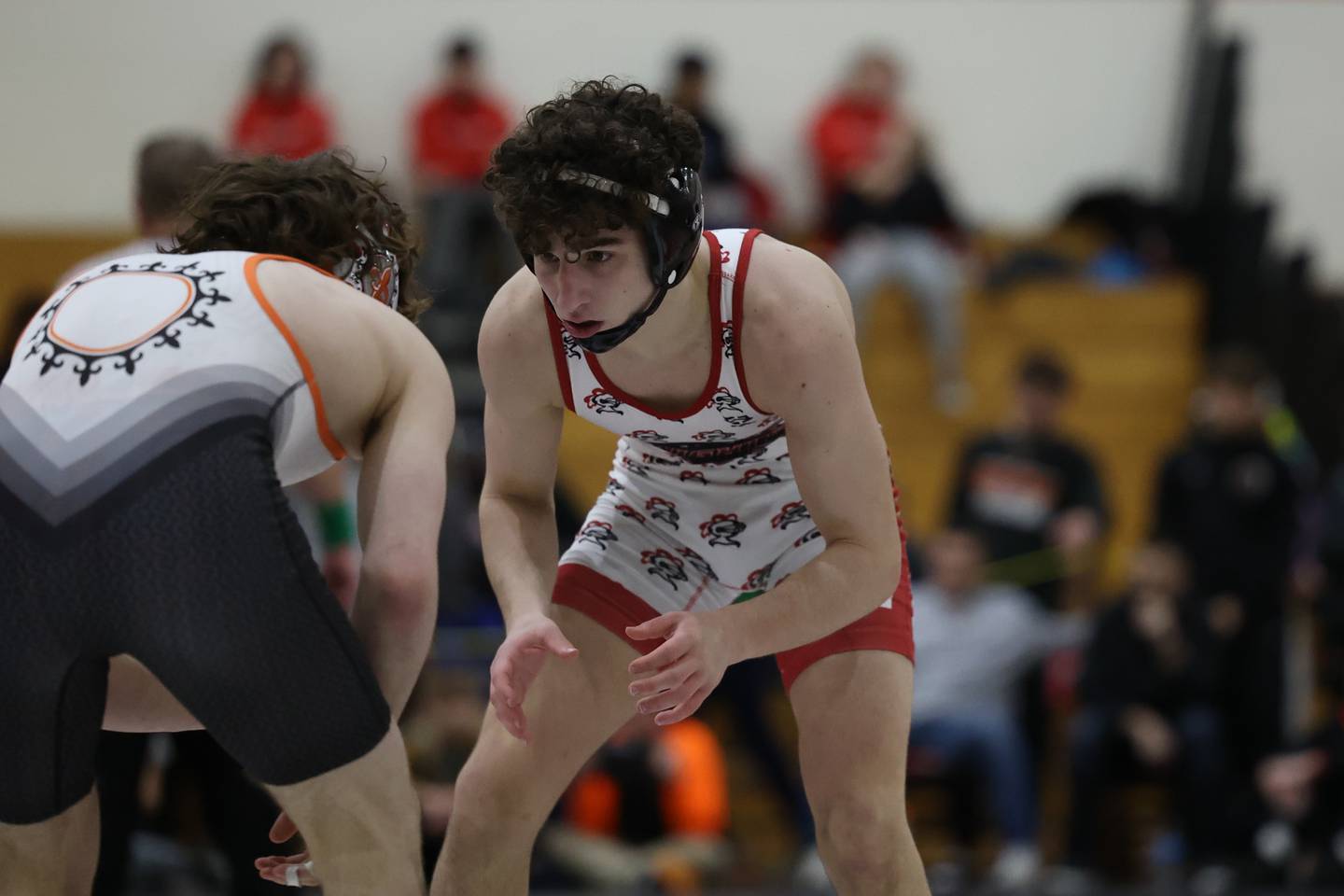 Lincoln-Way Central’s Nathan Knowlton faces off against St. Charles East’s Ben Davino in the Illini Classic 126 weight championship match at Lincoln-Way Central.