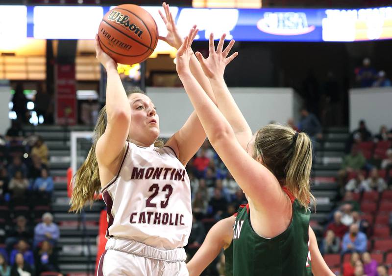 Montini's Shea Carver shoots over a Lincoln defender during their game Friday, March 1, 2024, in the IHSA Class 3A state semifinal at the CEFCU Arena at Illinois State University in Normal.