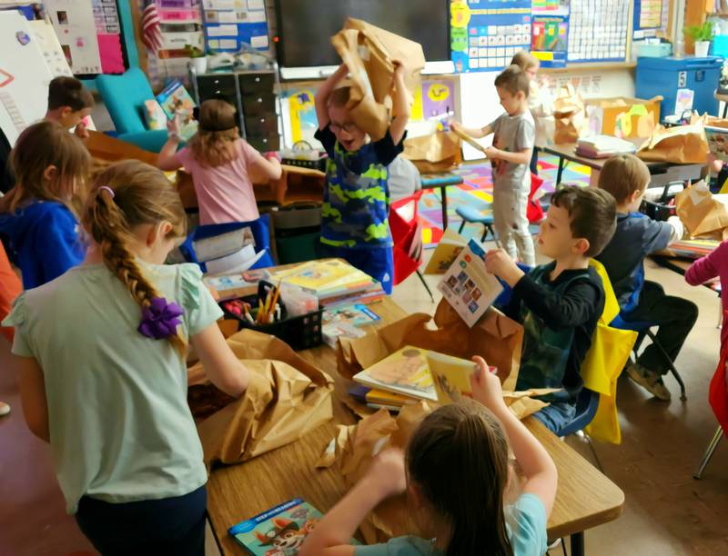 On Monday, April 3, the students were able to tear open packages to celebrate the results from the drive. All students received a minimum of five books as some children will receive as many as 10.