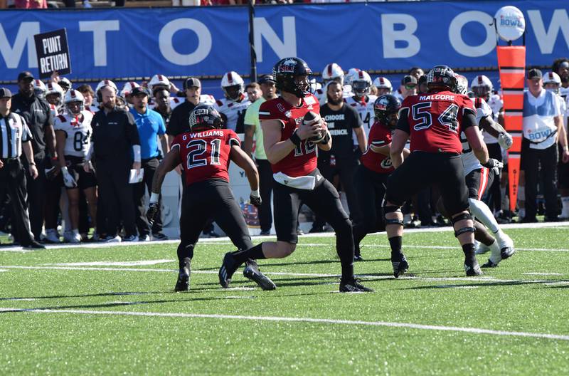 NIU quarterback Rocky Lombardi looks for a receiver during the Huskies' 21-19 Camellia Bowl win against Arkansas State on Saturday, Dec. 23, 2023.