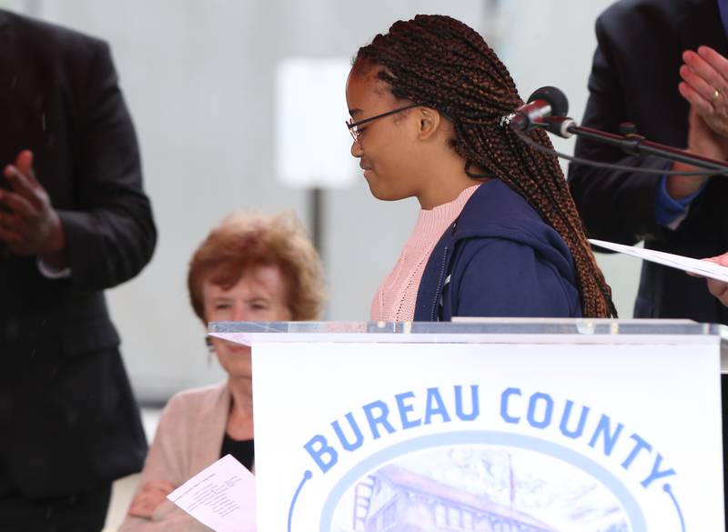 Selina Chin, Princeton High School student reads the names of 45 soldiers who were from Bureau County that fought in the Civil War. All of the soldiers were African American.