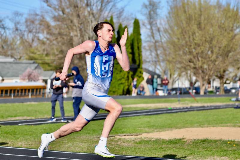 Princeton's Gavin Lanham hits the curve in the 4 x 100 relay in Tuesday's Howard-Monier Invite.